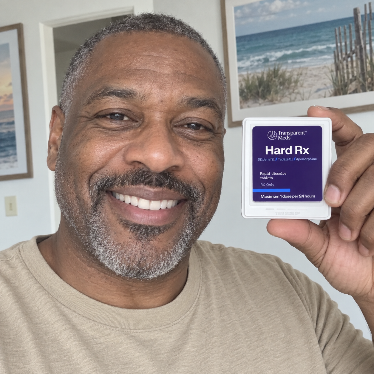 Man holding a Hard Rx case beside his face